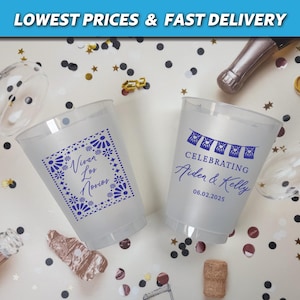 May include: Two clear plastic cups with blue and white designs. One cup says "Celebrating Aiden & Kelly 06.02.2025" and the other says "Viva Los Novios".