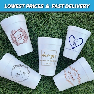 May include: Five white foam cups with different designs and text. The cups feature a floral wreath with the letter H, a heart with a fishing hook and the letter H, a square with the text "daveys" and the text "HANAH & PARKER 12.18.2024", a wreath with the letters M and A, and a wreath with the text "The Woods".