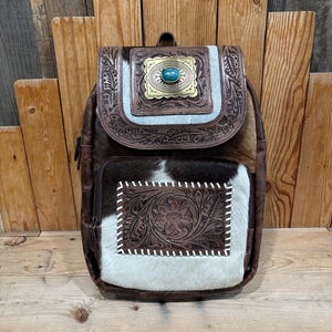 ¡Mochila de piel de vaca para porte oculto!