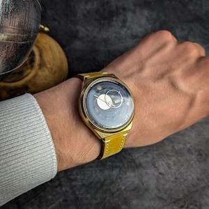 Orologio vintage RAKETA Kopernik. Lancette sole-luna. Sistema solare con quadrante personalizzato. Ottimo regalo. Calendario perpetuo. 2628HA meccanico. Placcato oro