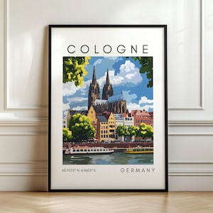 Puede incluir: Una impresión artística enmarcada con una colorida ilustración de Colonia, Alemania. La obra representa la Catedral de Colonia, edificios y un río con barcos. La palabra "COLOGNE" está en la parte superior y "GERMANY" en la inferior.