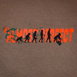 Streetwear ‘Devolution’ t-shirt. Comfortable shirt for men and women. Expressive and unique design representing the human pursuit of money.