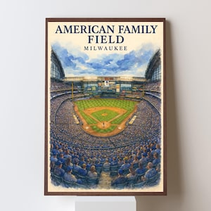 May include: A framed watercolour print of American Family Field, Milwaukee. The image shows a panoramic view of the baseball stadium, filled with spectators in blue seating. The sky is a watercolour wash of blue and white. Text at the top reads "AMERICAN FAMILY FIELD MILWAUKEE".