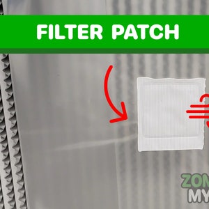May include: A white filter patch with a red wind symbol, labeled "FILTER PATCH" in green text. The patch is attached to a clear plastic surface.