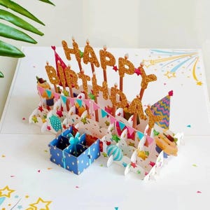 Carte de joyeux anniversaire 3D pop-up - Carte de voeux faite main avec lettres scintillantes, cadeaux, thème de fête - Carte surprise unique pour enfants et adultes