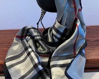 Silky Winter Style with This Silky Plaid Scarf - Cozy, Chic, and Versatile in Black, Gray, White & Red Hues. The Perfect Coat Accent!