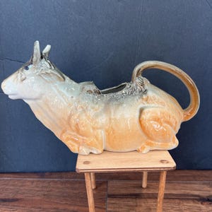 Vintage Brown Cow Creamer – Ceramic Milk/Cream Pitcher, Reclining Cow Design, Likely Japanese, Perfect for Collectors or Farmhouse Décor
