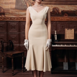 Salome – schmeichelndes Meerjungfrauenkleid mit V-Rücken für verführerische Silhouetten