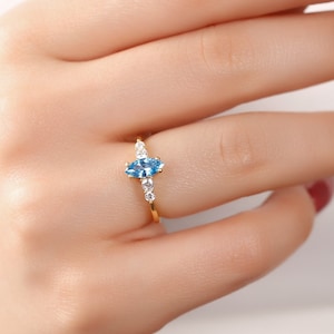14k Gold Marquise Cut Topaz Ring with Diamond Accents