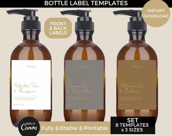 May include: Set of three brown glass bottles with labels for hand soap, lotion, and body wash. The labels are white, gray, and brown with gold text. The labels feature different scents: White Tea & Ginger, Coconut & Vanilla, and Patchouli & Cedar. The text on the labels reads "Natural Hand Soap", "Natural Lotion", and "Natural Body Wash". The text also says "Made with essential oils". The bottles are 8 oz (237 ml). The image also includes the text "Front & Back Labels", "Brand", "Set 8 Templates x 3 Sizes", "Fully Editable & Printable", and "Edit in Canva".