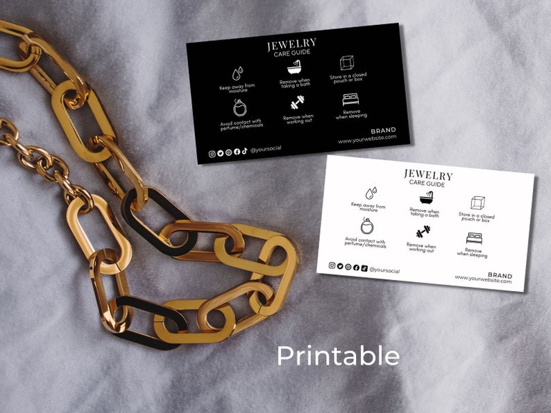May include: Printable jewellery care guide card with black and white icons and text. The card includes instructions on how to keep jewellery away from moisture, remove jewellery when taking a bath, working out, or sleeping, and store jewellery in a closed pouch or box. The card also includes the text "JEWELLERY CARE GUIDE" and "BRAND" with a website address.