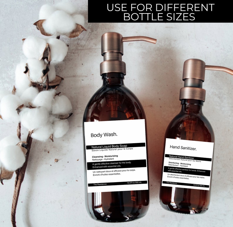 May include: Two amber glass bottles with copper pumps, one labeled "Body Wash. Natural Liquid Body Soap" and the other labeled "Hand Sanitizer. Natural Hand Sanitizer". Both bottles have white labels with black text.