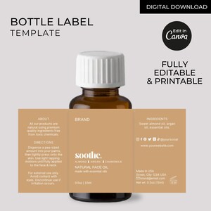 Pode incluir: Uma garrafa de vidro marrom com uma tampa branca e um r&oacute;tulo que diz "soothe. NATURAL FACE OIL" com os ingredientes listados como "ALMOND | ARGAN | CHAMOMILE" e "made with essential oils". O r&oacute;tulo tamb&eacute;m inclui o texto "0.5oz | 15ml".