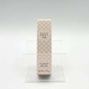Front view of Gucci Envy Me Eau de Toilette 30ml. Compact pink and white packaging, ideal for travel or gifting.