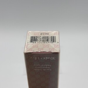 Bottom view of Gucci Envy Me Eau de Toilette 30ml. Includes batch code for authenticity.