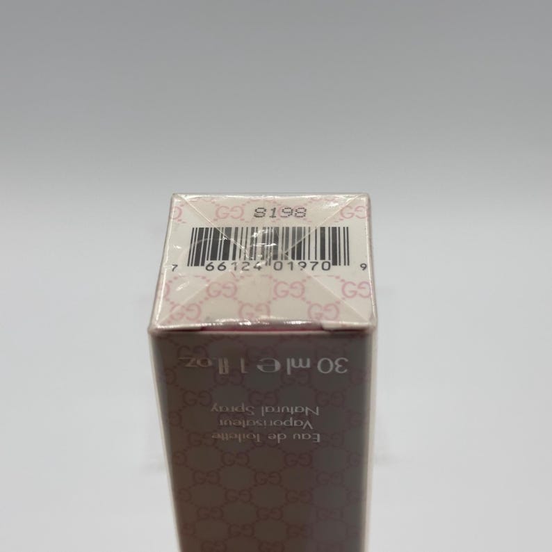 Bottom view of Gucci Envy Me Eau de Toilette 30ml. Includes batch code for authenticity.