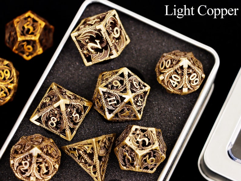 Hollow dargon metal dnd dice set for role playing games , Metal dungeons and dragons dice set dnd , Metal polyhedral rpg d&d dice set Light Copper Dice