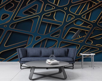 May include: A dark blue couch with a coffee table in front of it. The wall behind the couch is covered in a geometric wallpaper with gold and blue lines.
