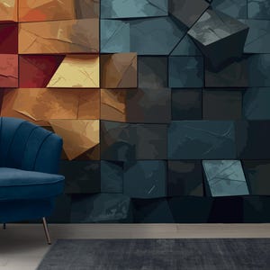 May include: A modern interior scene featuring a blue velvet armchair with gold legs, a dark gray rug, and a geometric wall art installation in shades of red, gold, and blue. A potted plant adds a touch of nature.