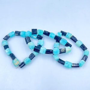 33Gram natural black tourmaline and blue argonite calcite handmade bracelet from Peshawar Pakistan.