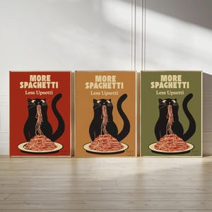 May include: Three rectangular wall art prints featuring a black cat eating a plate of spaghetti. Each print displays the text MORE SPAGHETTI Less Upsetti in a different background color: red, tan, and olive green. The cat has a long tail.