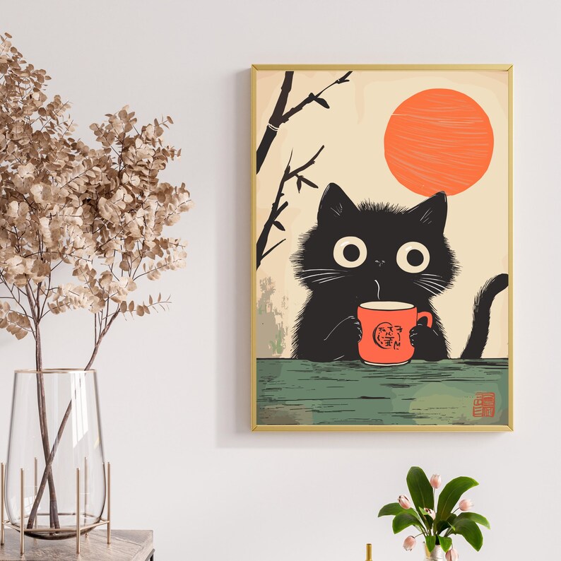 May include: A framed art print featuring a black cat with large eyes, holding a red mug with Japanese text. The cat is set against a backdrop of a rising orange sun and bamboo branches, with a green and beige color scheme.