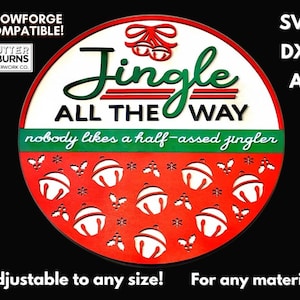 May include: Red and green Christmas sign with the text "Jingle All The Way" and "nobody likes a half-assed jingler". The sign is decorated with bells and holly.