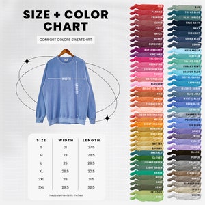 May include: Size chart for a sweatshirt with a variety of colors. The chart shows the width and length of the sweatshirt in inches for sizes S, M, L, XL, 2XL, and 3XL. The sweatshirt is light blue.