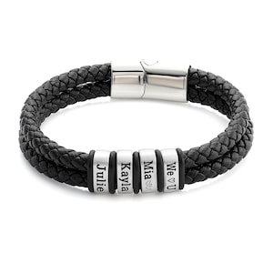 May include: Black leather bracelet with a silver clasp and four silver beads with the names "Julie", "Kayla", "Mia", and "We ♥ U" engraved on them.