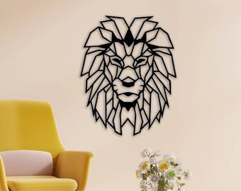 May include: A black wall-mounted lion head sculpture featuring a geometric, angular design with sharp lines and a stylized mane. The piece is constructed from thin, flat material and displays a symmetrical, abstract representation of a lion face.