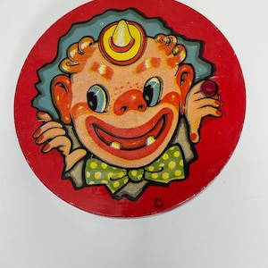 Vintage T CONN Litho Tin Noise Maker Clown Ratchet Wood Handle