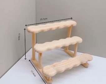 Estantería decorativa de madera de 3 niveles para exhibición y almacenamiento.