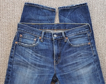 Jeans Levi's 511, talla 30-32W 34L, estilo unisex.