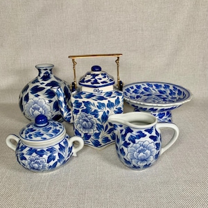 Set Of Vintage Thailand White/Blue Lotus Porcelain Teapot, Dessert Stand, Sugar Bowl, Creamer And Bud Vase.