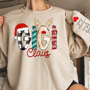 Custom Gigi Claus Sweatshirt and Hoodie, Christmas Grandma Claus Sweatshirt,Gift for Mom,Custom Mama Sweatshirt with Children Name on Sleeve
