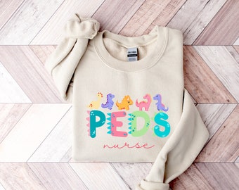 Pediatric Nurse Sweatshirt, PEDS Dinoaurs Shirt, PEDS Nurse Sweatshirt, Peds Nurse Shirt, Cute Peds Crewneck, Pediatric Nurse Gift, Pastel