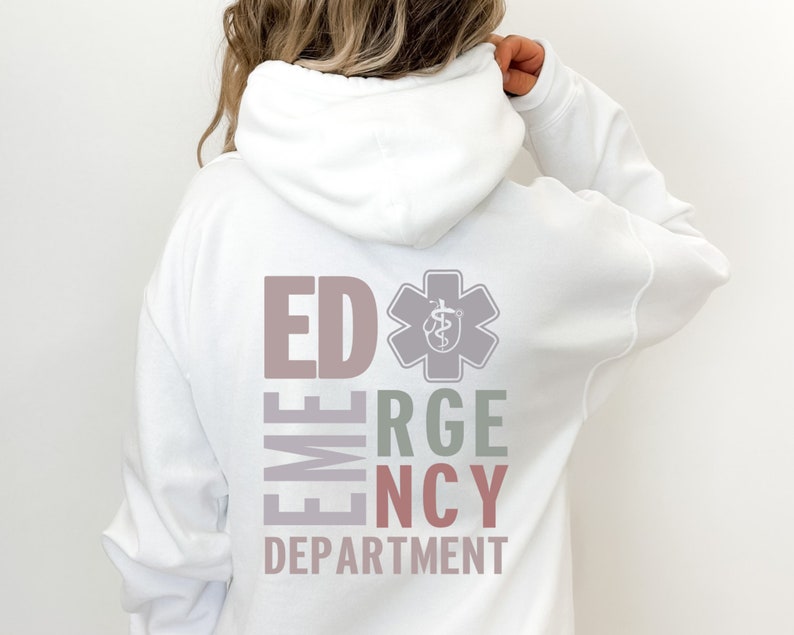 May include: White hooded sweatshirt with the text "ED EMERGENCY DEPARTMENT" in a vertical column with a medical symbol in the center. The text is in different colors, including pink, gray, green, and red.