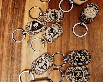 One Liga Mexicana with Aztec Calendar Wooden Keychain, Un Llavero de Madera de la Liga MX con Calendario Azteca