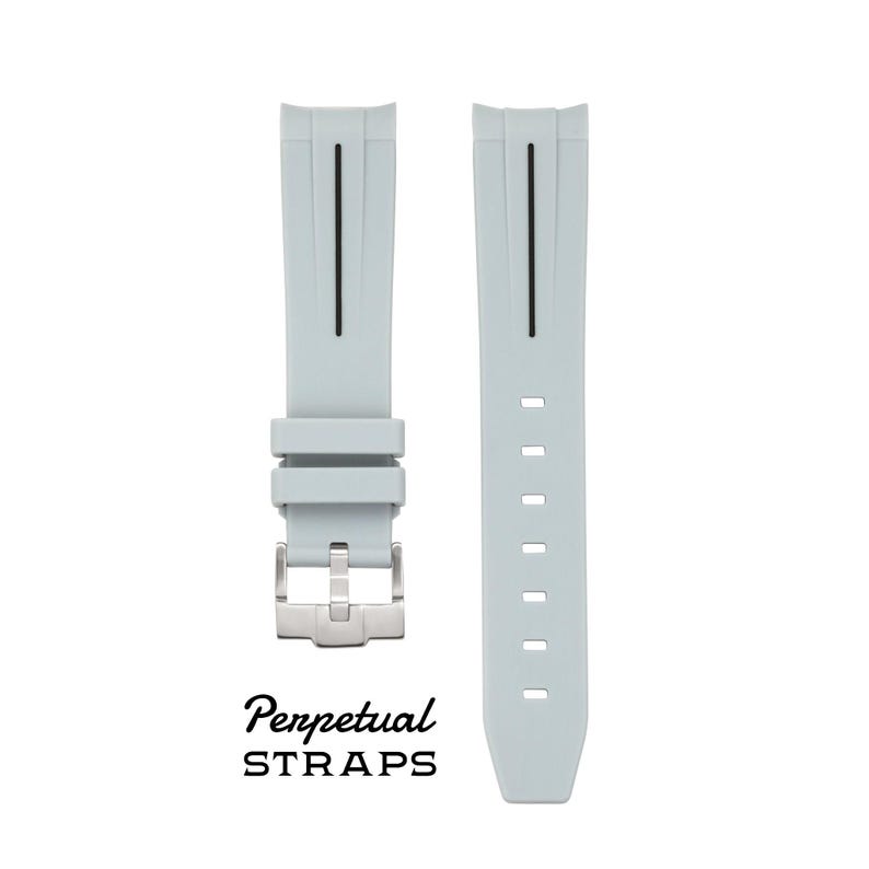 May include: Light gray watch strap with a stainless steel buckle. The strap has a vertical black stripe and the text "Perpetual STRAPS" in black cursive font.