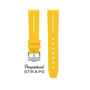 May include: Bright yellow watch straps with a silver buckle. The straps are made of a flexible material and feature vertical grooves. The text "Perpetual STRAPS" is printed in black cursive font.