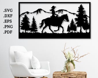 May include: Black metal wall art depicting a silhouette of a person riding a horse through a mountain landscape. The artwork includes trees and the text .SVG, .DXF, .EPS, .PNG, and .PDF.