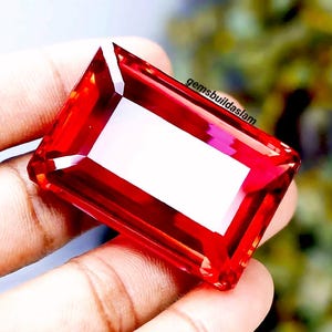 Rubí de talla esmeralda de 200 quilates certificado, piedra suelta facetada de color rojo intenso, ideal para coleccionistas, joyería y como pieza de colección.