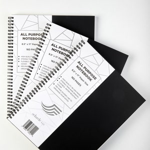 May include: Three black spiral notebooks with white geometric patterns on the cover. The notebooks are stacked on top of each other. The text on the cover reads "All Purpose Notebook" and "8.5" x 11" Paper Size" and "160 Pages".