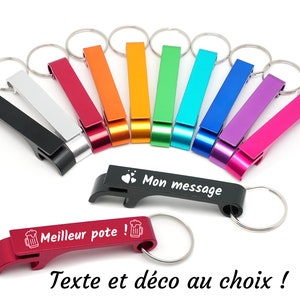 Peut inclure: Un ensemble d'ouvre-bouteilles en métal de différentes couleurs avec des anneaux de clés. Les ouvre-bouteilles sont de couleurs variées, notamment rouge, orange, vert, bleu, violet et argent. Chaque ouvre-bouteille a un design différent, notamment un cœur, une chope à bière et le texte "Mon message".