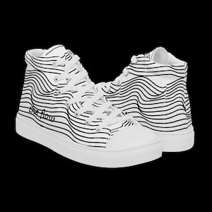 May include: White high-top canvas sneakers with black wavy lines and the text "the flow" on the side.