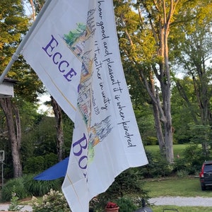 May include: White flag with purple lettering that reads "ECCE BO" and a quote from Psalm 133: "Behold how good and pleasant it is when kindred are together in unity."