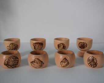Wooden napkin rings and egg cups pyrography decorated 'Seashells'