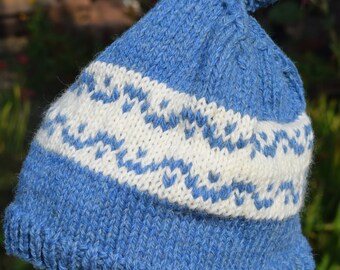Hand knitted Fairisle hat with removable pom pom. Made to Order