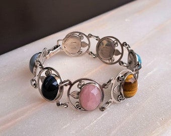A silver and multi stone bracelet by Oblo