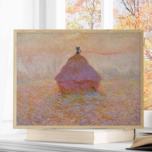 May include: A framed painting depicting a black cat perched atop a haystack in a field. The haystack is pink, and the field is a hazy purple and blue. The painting is displayed on a white shelf with a book in front of it.